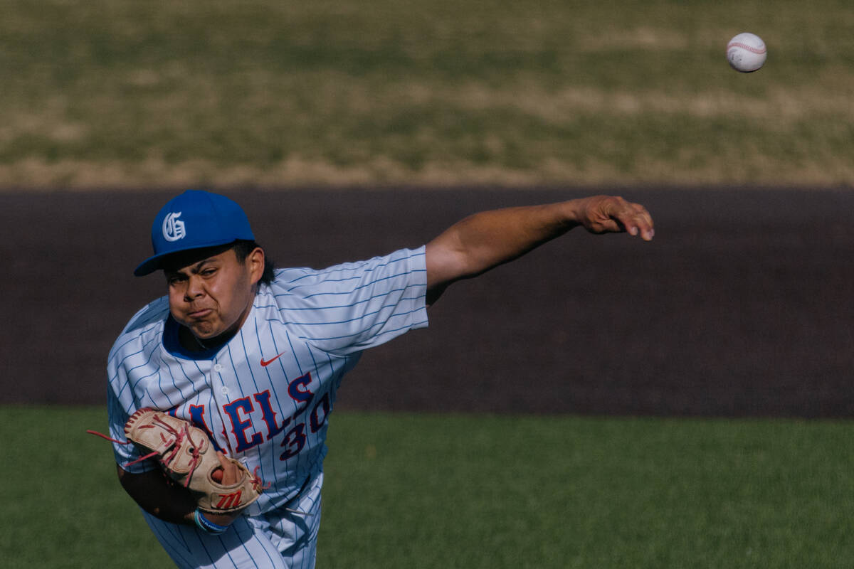 Bishop Gorman pitcher Koa Young (30) hurls a pitch forward during the first inning of a game ag ...