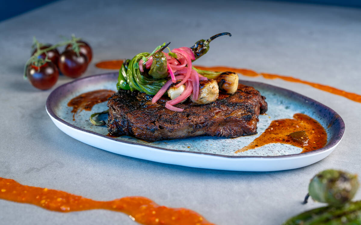Grilled ribeye from Patio, a poolside dining experience debuting April 4, 2025, at the M Resort ...