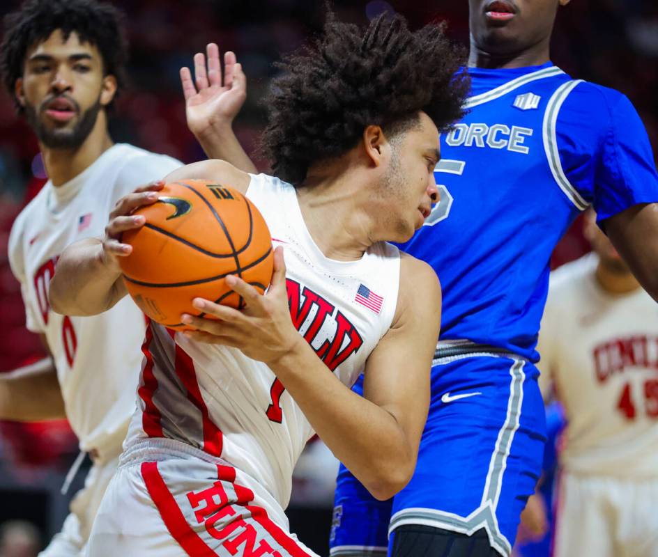 Rebels forward Jalen Hill (1) works the ball during a Mountain West men’s tournament NCA ...