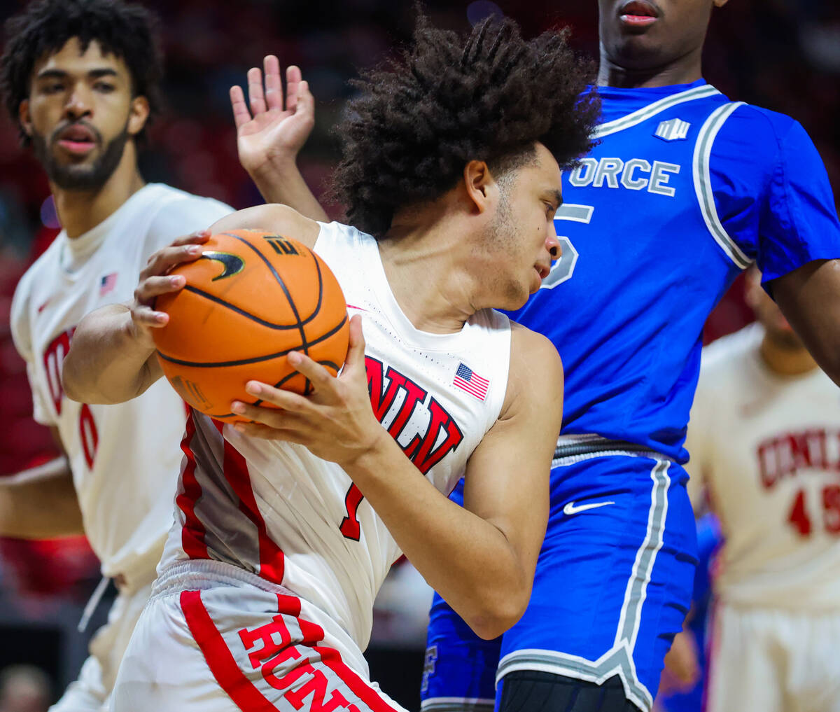 Rebels forward Jalen Hill (1) works the ball during a Mountain West men’s tournament NCA ...