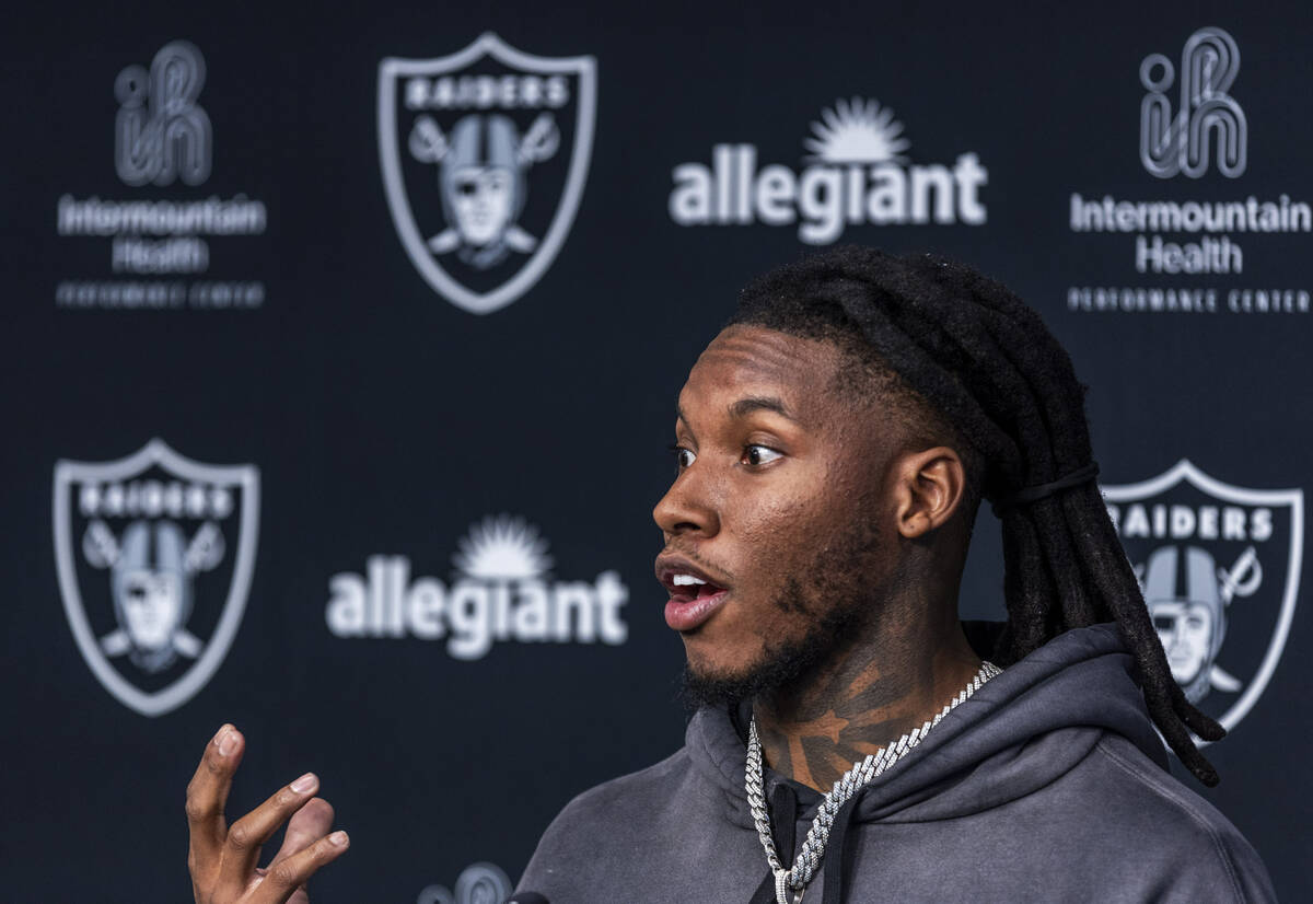 Safety Lonnie Johnson, Jr. answers a question during his initial interview with the press at th ...