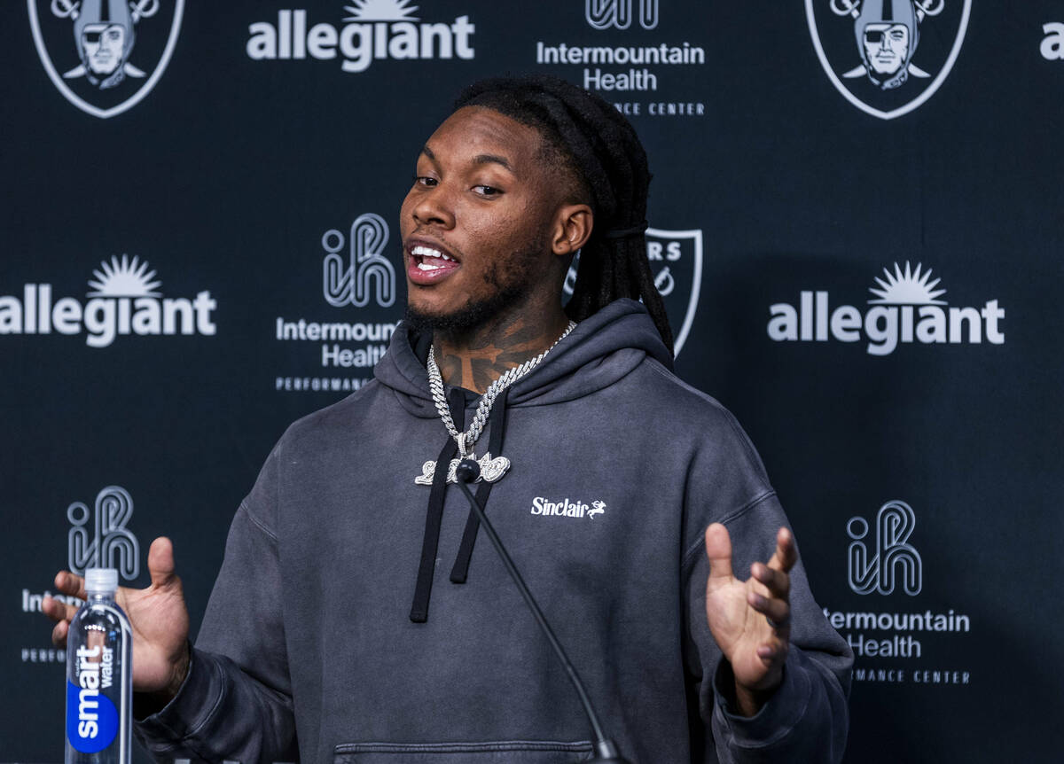 Safety Lonnie Johnson, Jr. answers a question during his initial interview with the press at th ...