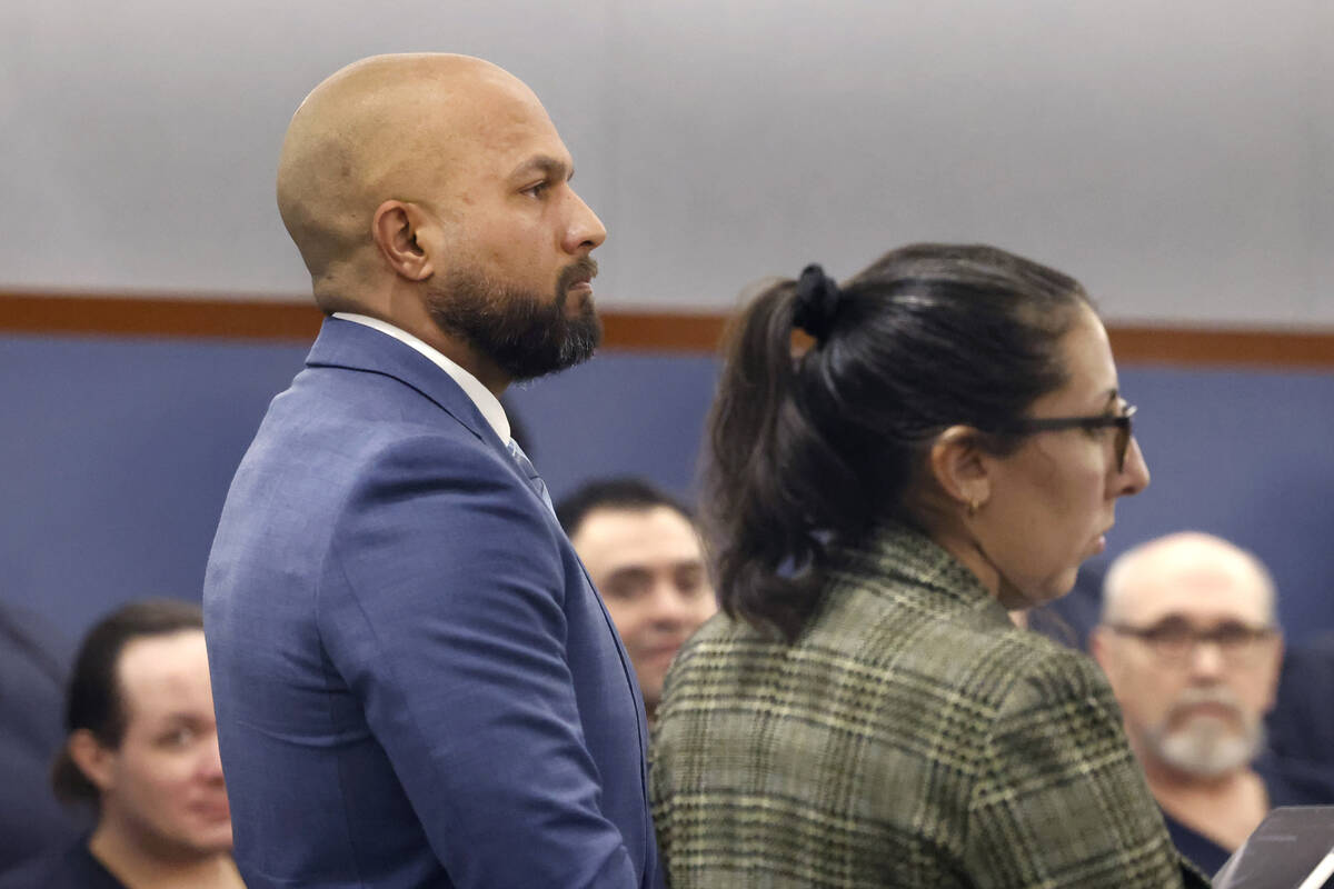 Sgt. Kevin Menon, accused of misconduct and possession of child porn, appears in court with his ...