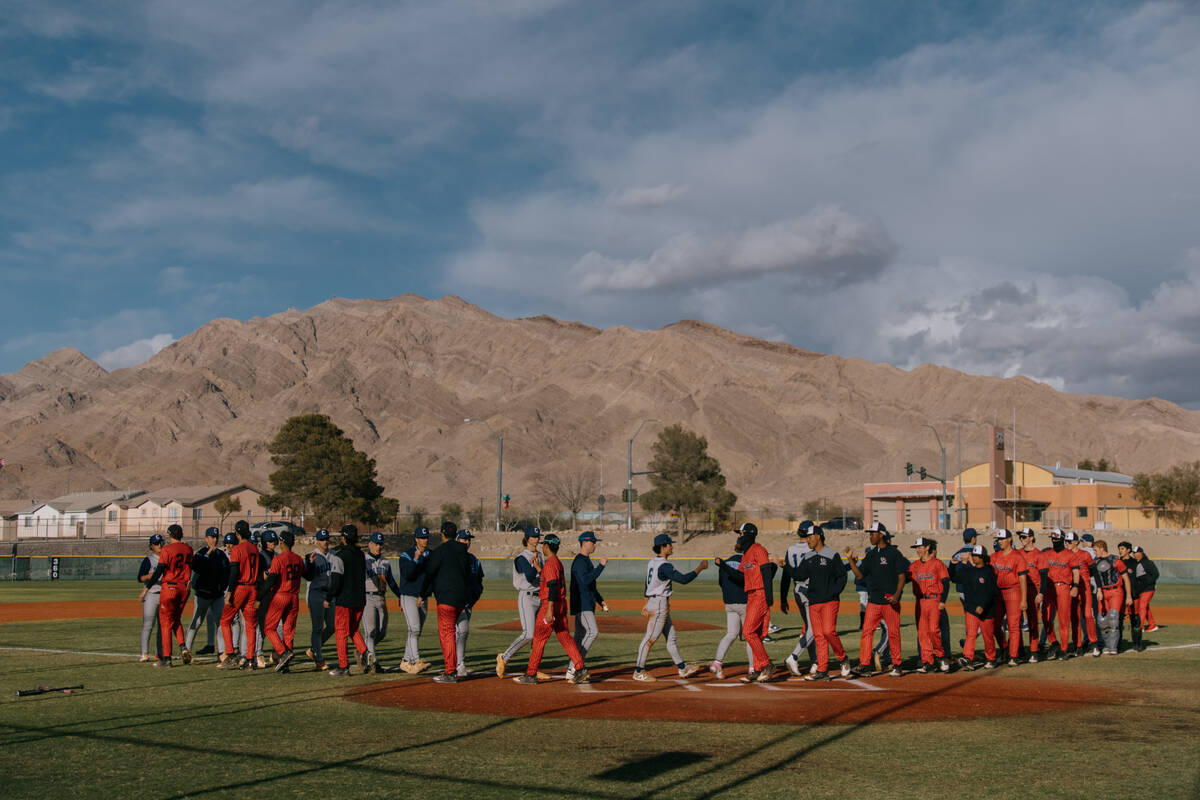 The Centennial Bulldogs and the Las Vegas Wildcats wish each other a good game after their matc ...