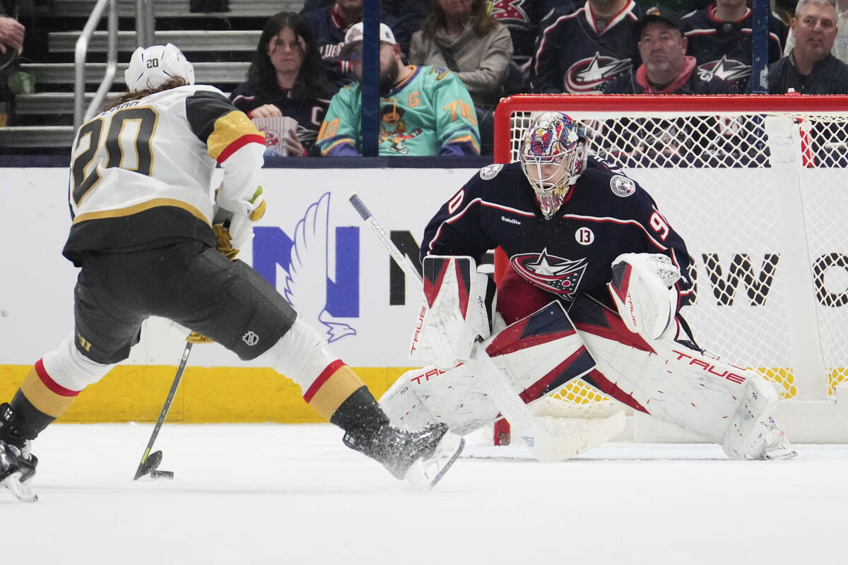 Vegas Golden Knights left wing Brandon Saad (20) skates in on Columbus Blue Jackets goaltender ...