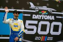 Chase Elliott waves during driver introductions before the NASCAR Daytona 500 auto race at Dayt ...