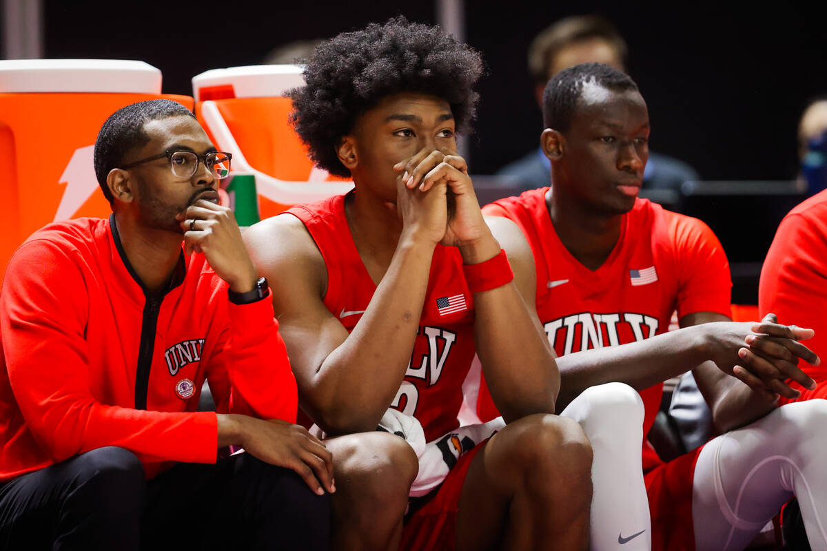 Rebels forward Jacob Bannarbie (12) reacts to game action from the bench during a Mountain West ...