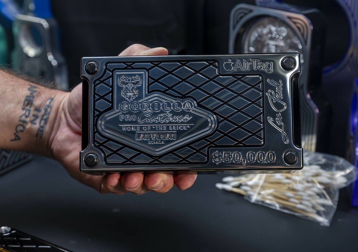 Owner Johneric Stensrud with Gorilla Pro Customs shows the bottom plate on a custom box with a ...