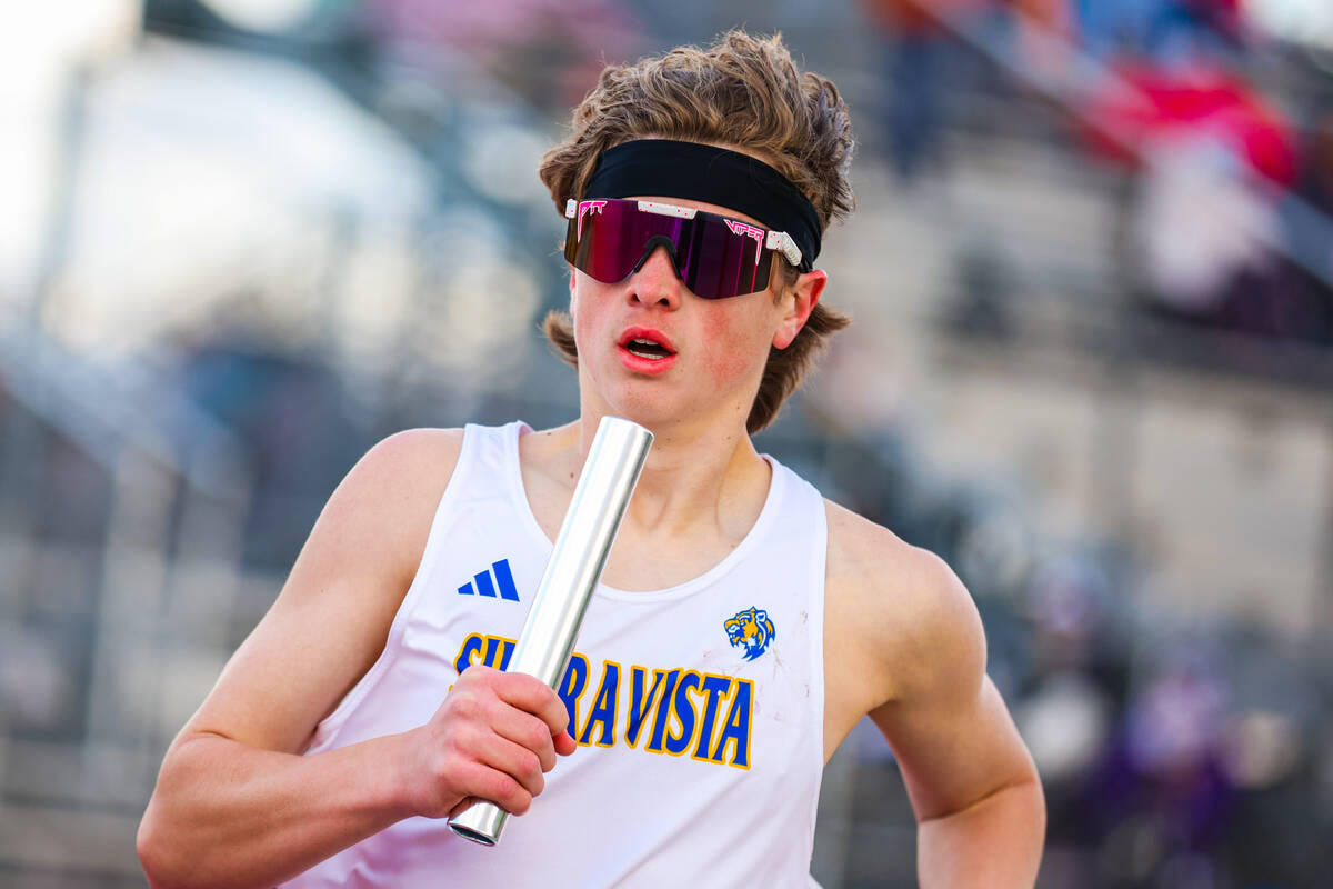 A Sierra Vista competitor runs during a high school track and field meet at Palo Verde High Sch ...