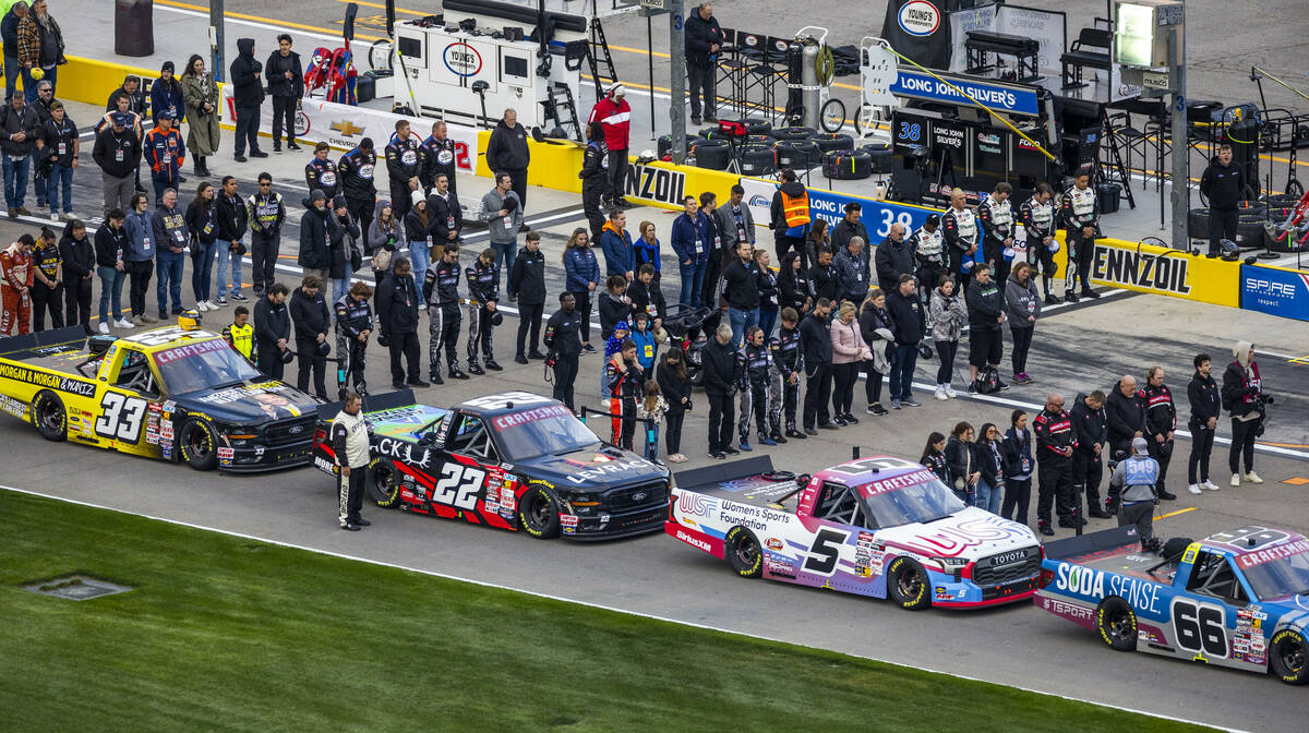 Teams and their trucks on the track for the National Anthem before the NASCAR Craftsman Truck S ...