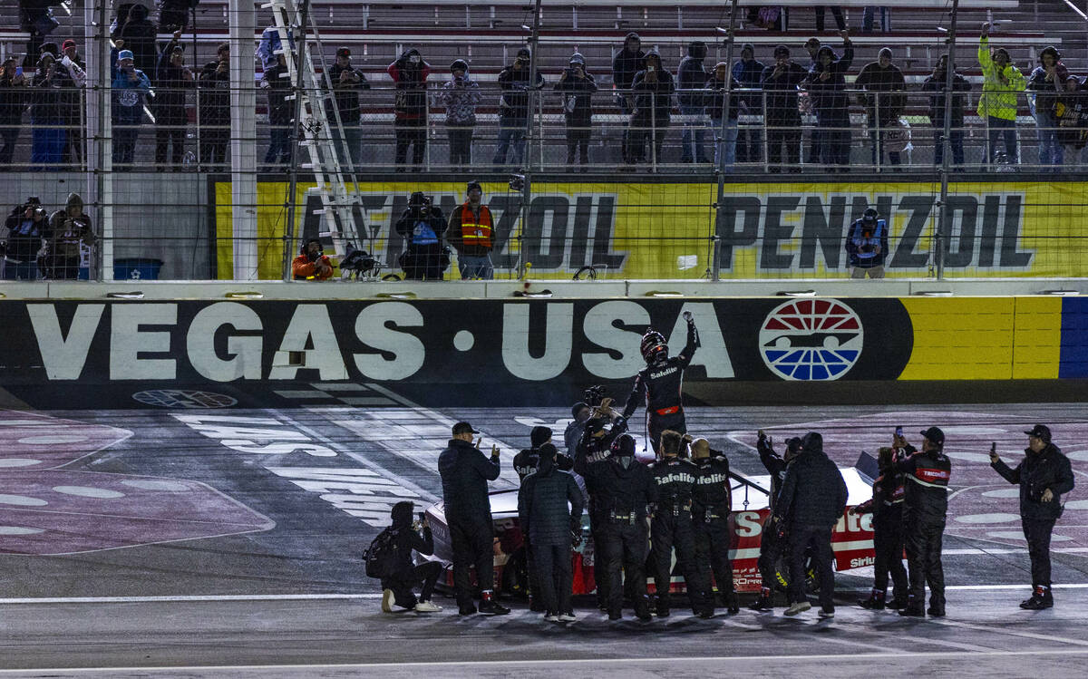 Corey Heim (11) and his team celebrate at the finish line after he wins the NASCAR Craftsman Tr ...