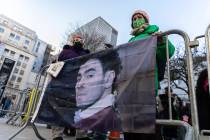 Luigi Mangione supporters stand outside the Supreme Court on Friday, Feb. 21, 2025 in New York. ...