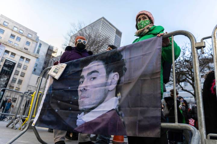 Luigi Mangione supporters stand outside the Supreme Court on Friday, Feb. 21, 2025 in New York. ...