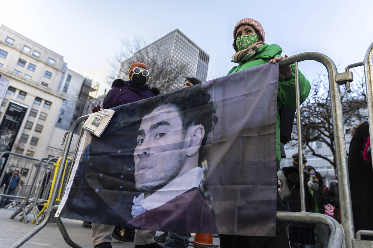 Luigi Mangione supporters stand outside the Supreme Court on Friday, Feb. 21, 2025 in New York. ...