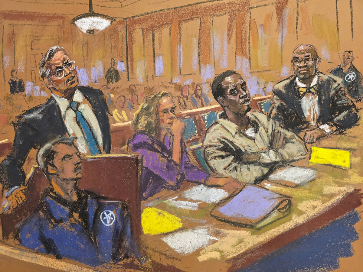 In this courtroom sketch, attorney Marc Agnifolo, left, speaks at the podium, as Alexandra Shap ...