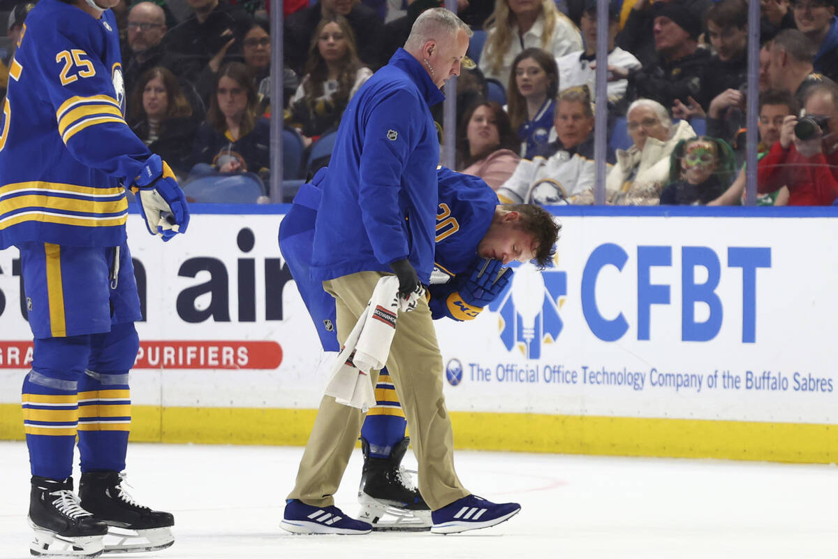 Buffalo Sabres center Jiri Kulich (20) is helped off the ice during the second period of an NHL ...