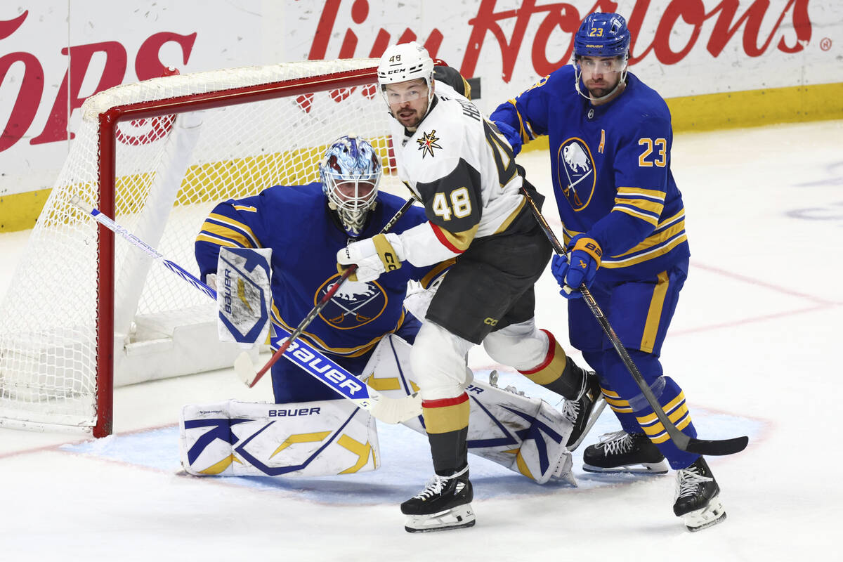 Vegas Golden Knights center Tomas Hertl (48) skates between Buffalo Sabres goaltender Ukko-Pekk ...