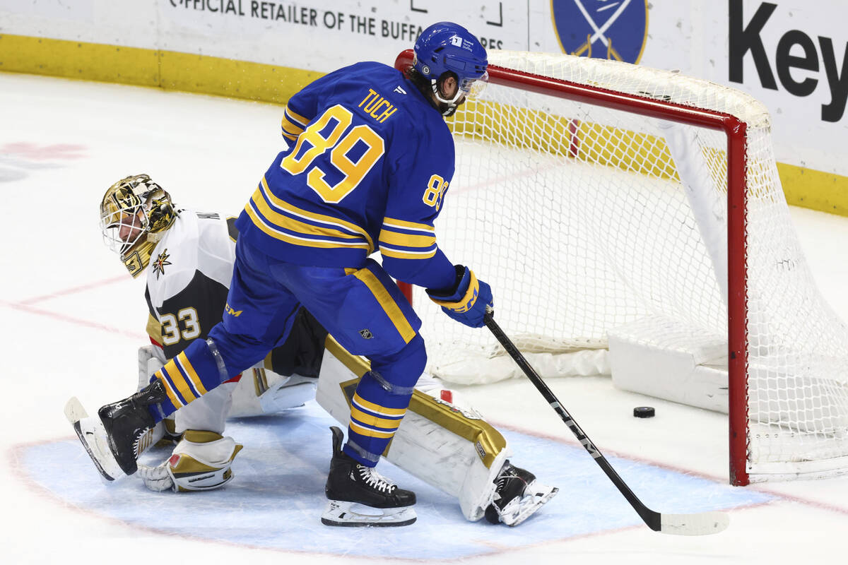 Buffalo Sabres right wing Alex Tuch (89) puts the puck past Vegas Golden Knights goaltender Adi ...