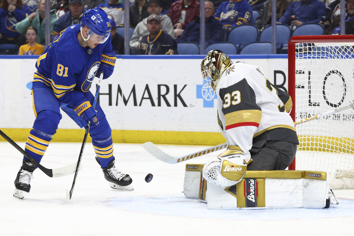 Buffalo Sabres center Sam Lafferty (81) is stopped by Vegas Golden Knights goaltender Adin Hill ...