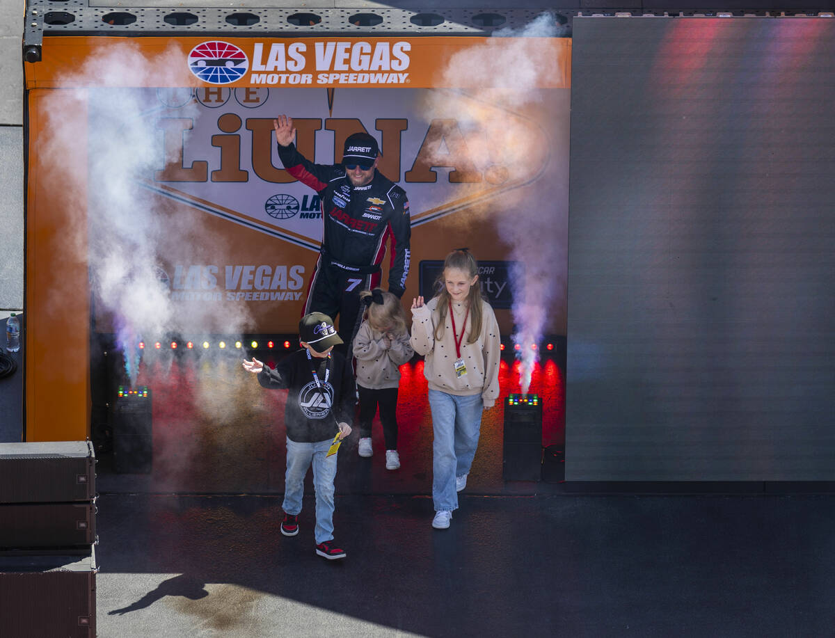 Driver Justin Allgaier (7) is introduced on stage joined by his family for The LiUNA NASCAR Xf ...