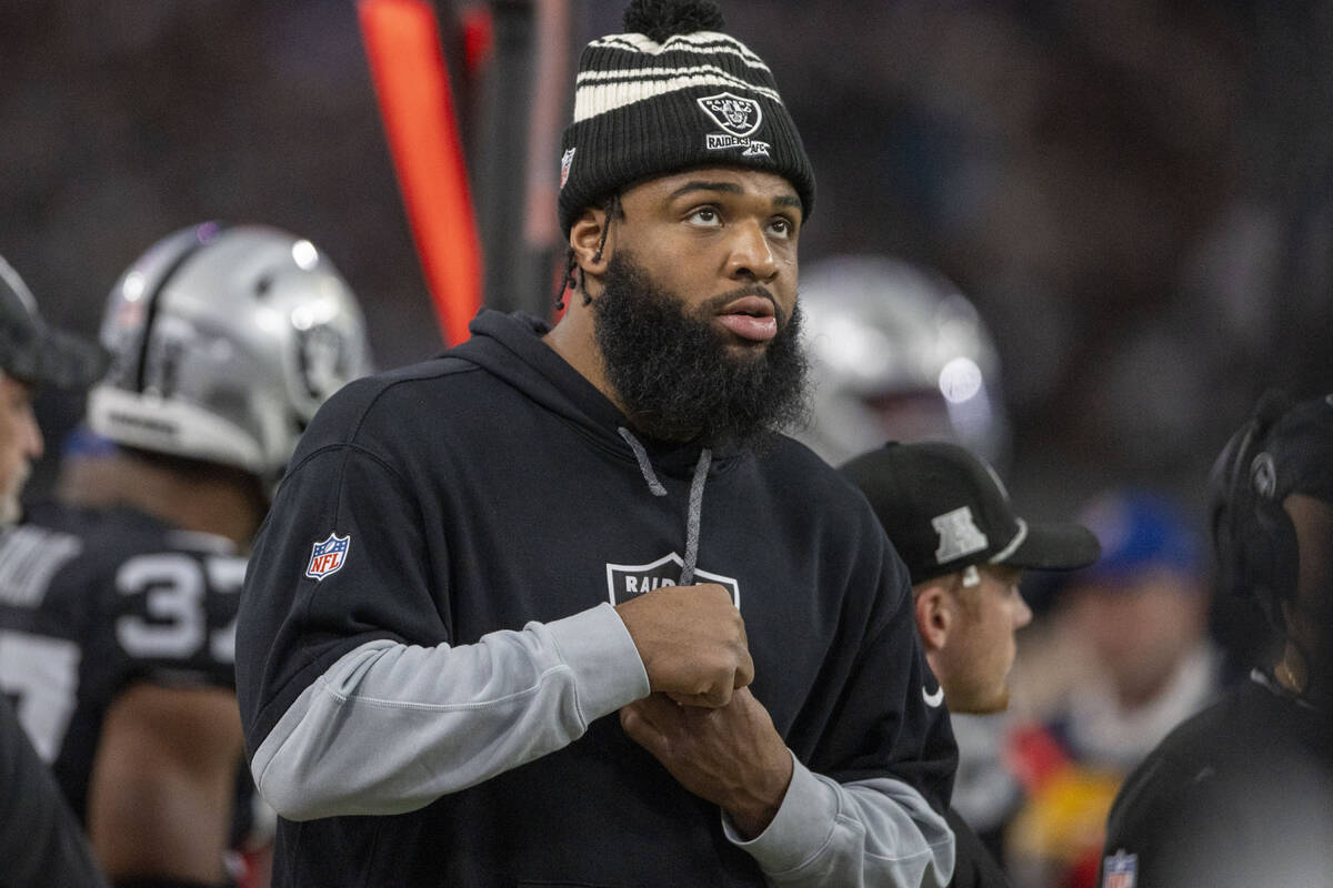 Raiders defensive tackle Christian Wilkins watches from the sideline during the second half of ...