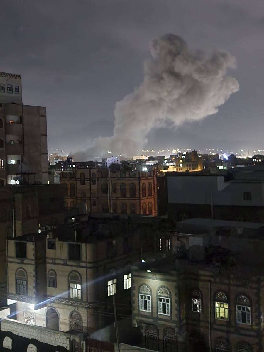 Smoke rises from a location reportedly struck by U.S. airstrikes in Sanaa, Yemen, Saturday, Mar ...
