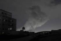 Smoke rises from a location reportedly struck by U.S. airstrikes in Sanaa, Yemen, Saturday, Mar ...