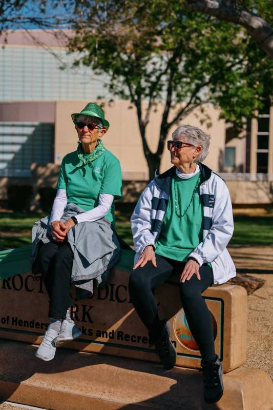 Sue Smuskiewicz, left, and Jeanne Brady, right, wait for the annual St. Patrick’s Day pa ...