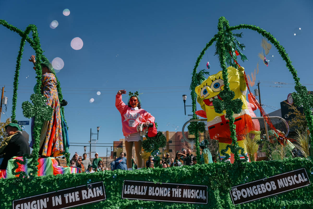 Super Summer Theatre’s float rolls down Water Street during the annual St. Patrick&#x201 ...