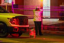 Mourners gather near a homicide scene on the 700 block of Bruce Street Saturday, March 15, 2025 ...