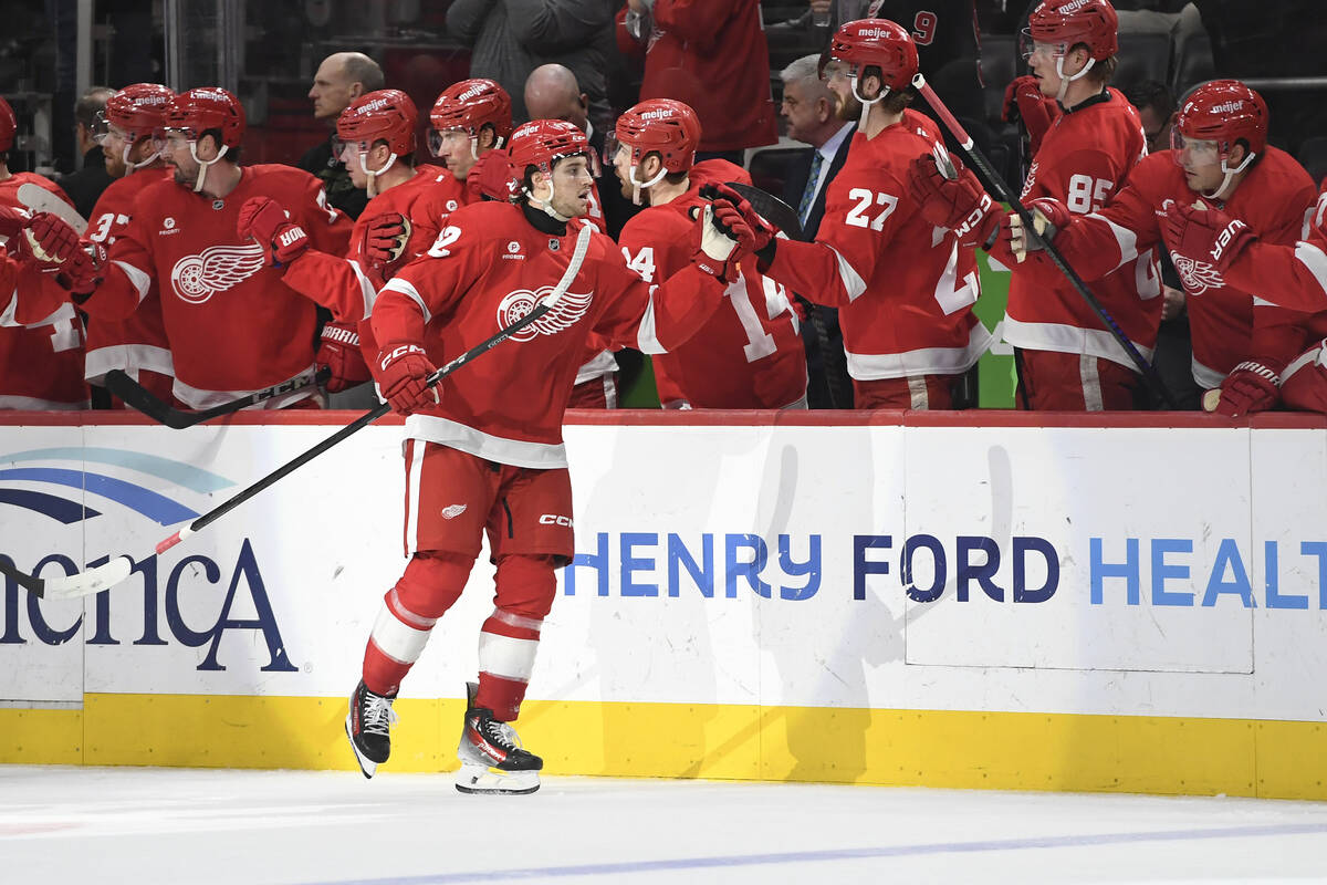 Detroit Red Wings center Marco Kasper (92) is congratulated after scoring a goal against the Ve ...