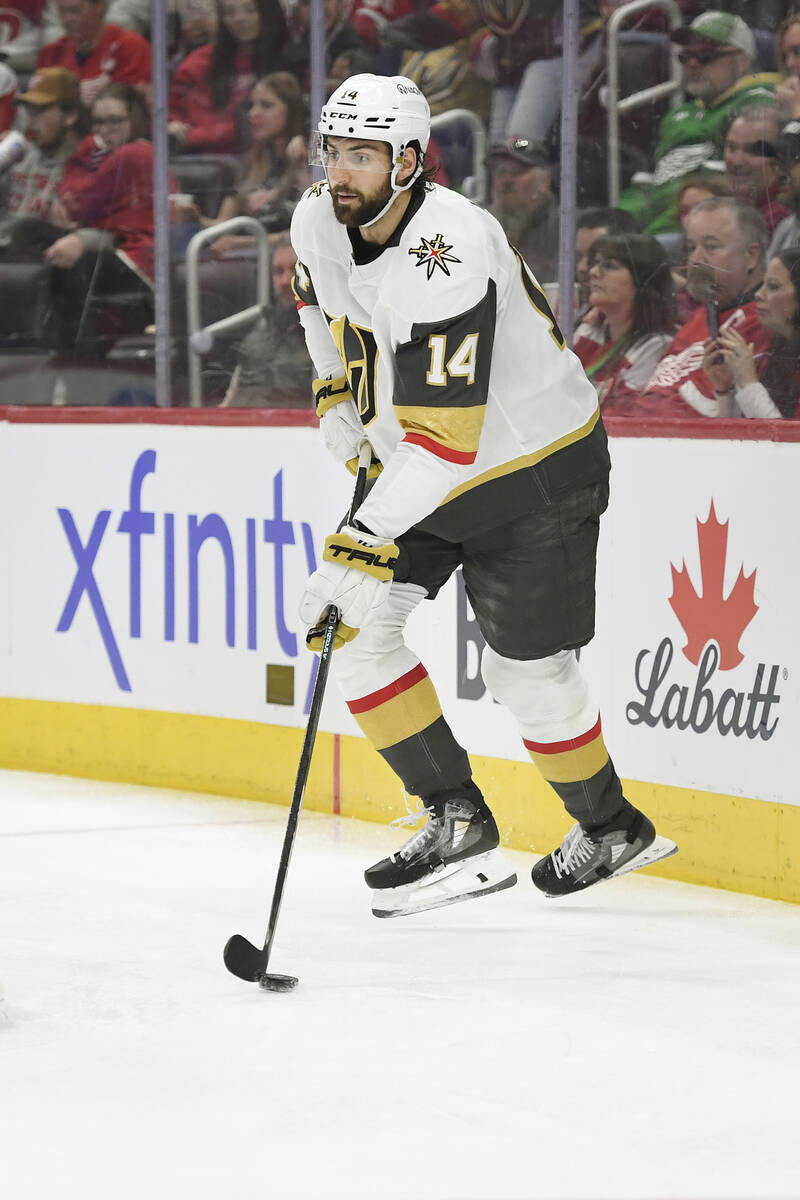 Vegas Golden Knights defenseman Nicolas Hague skates with the puck during the second period of ...