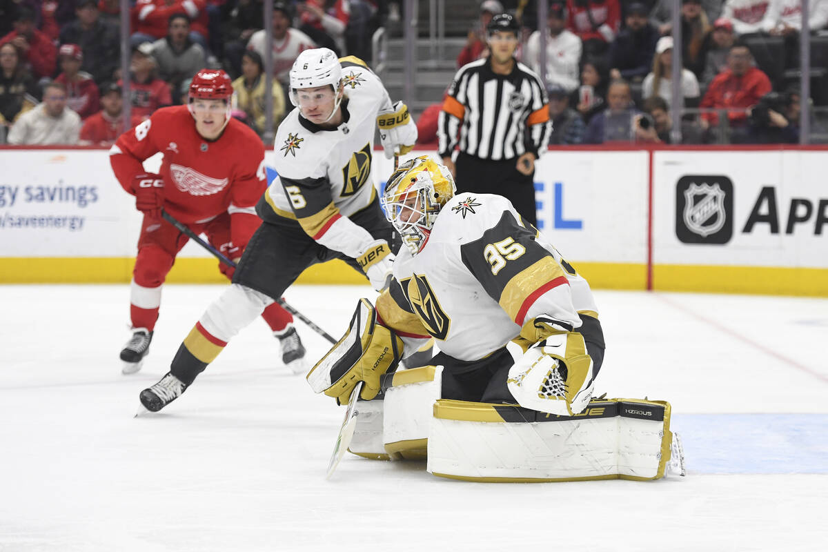 Vegas Golden Knights goaltender Ilya Samsonov (35) and defenseman Kaedan Korczak (6) watch duri ...