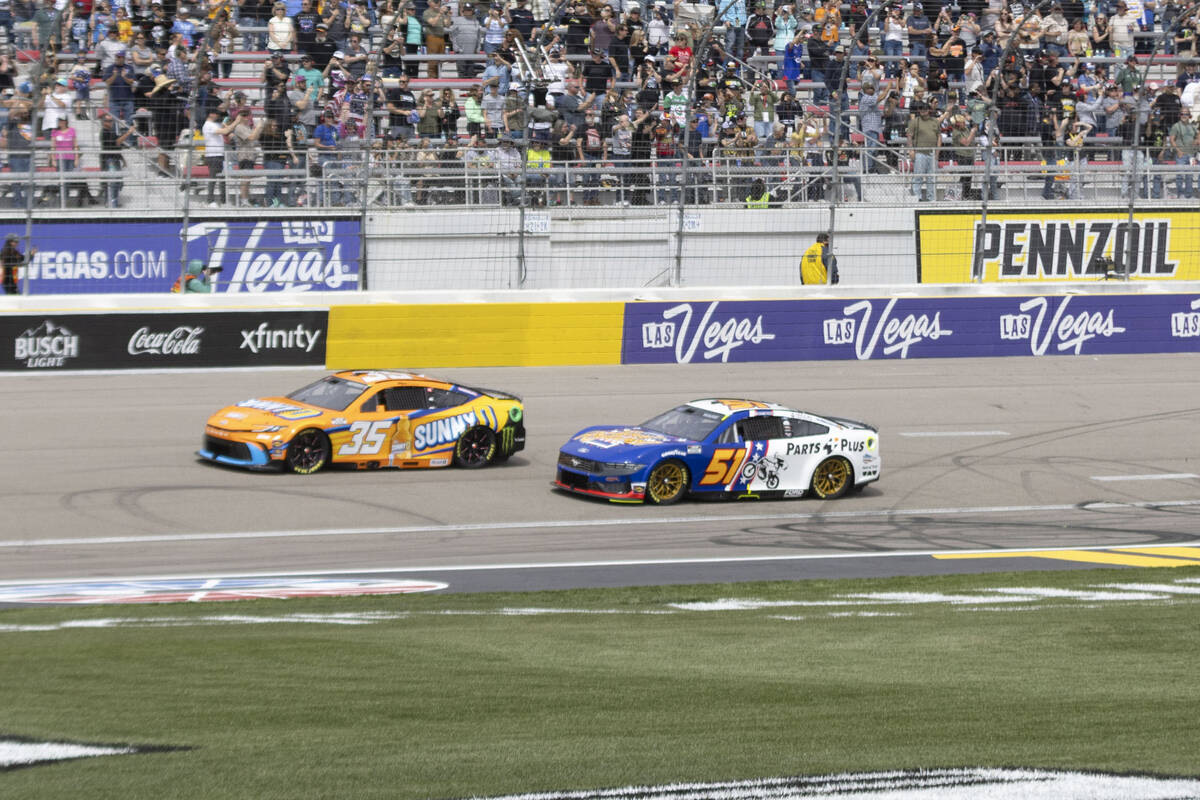 NASCAR Cup Series drivers Riley Herbst (35) and Cody Ware (51) race during the Pennzoil 400 NAS ...