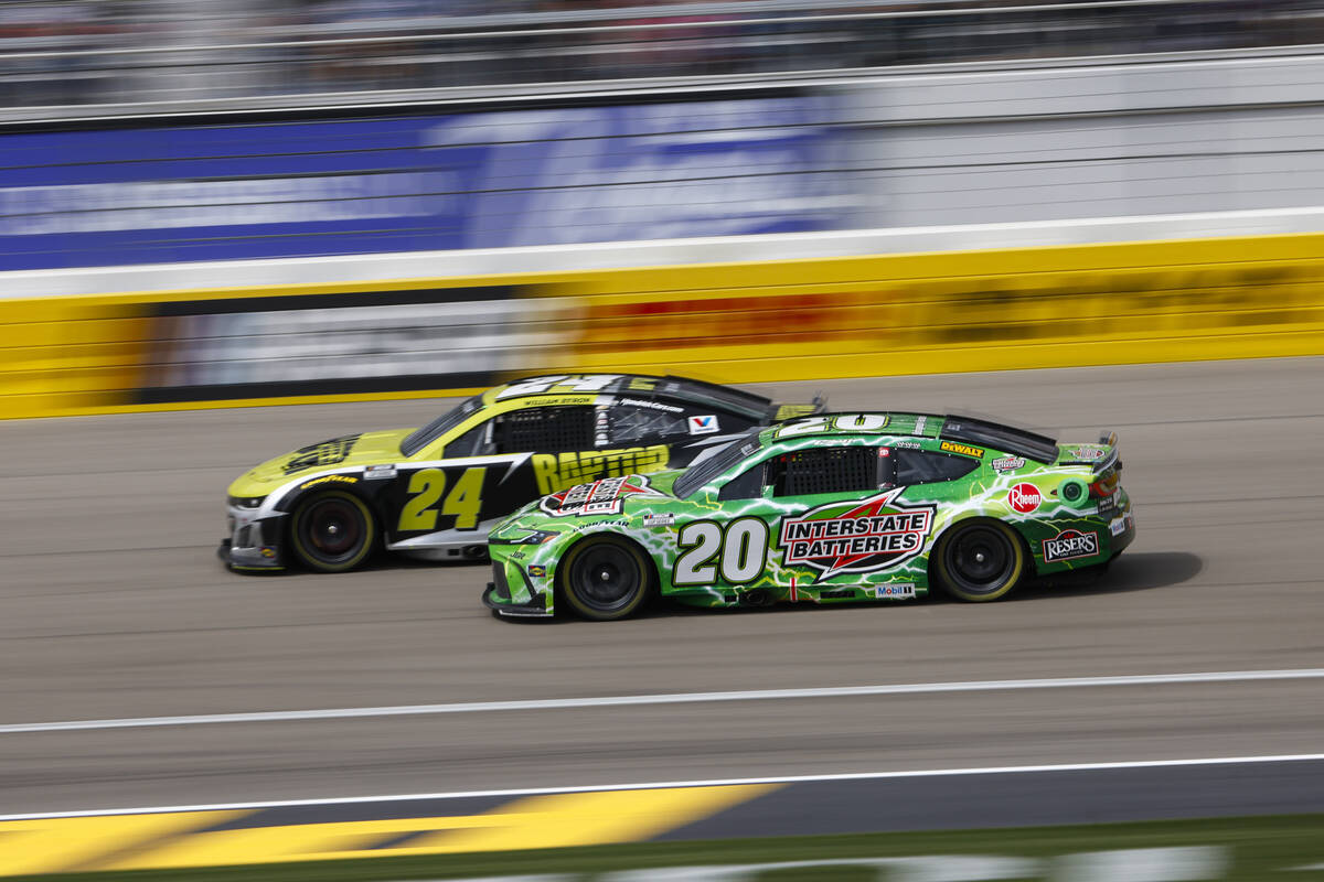 Drivers William Byron (24) and Christopher Bell (20) compete for position during the Pennzoil 4 ...