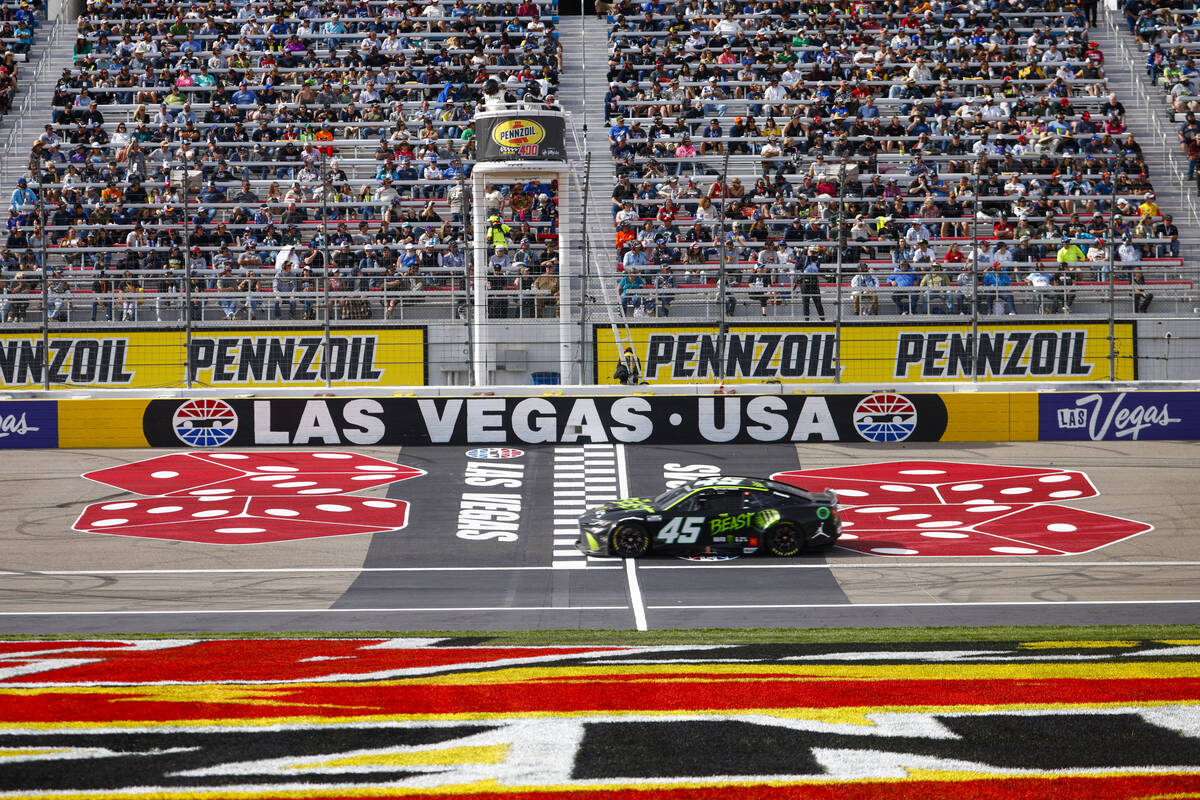 Driver Tyler Reddick (45) maintains the lead during the Pennzoil 400 NASCAR Cup Series race at ...
