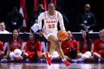 UNLV Lady Rebels guard Amarachi Kimpson (33) brings the ball up court against San Diego State d ...