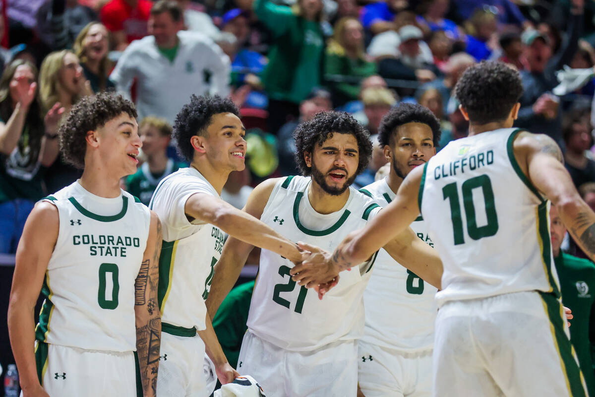 Colorado State Rams guard Nique Clifford (10) is celebrates by his teammates on the bench durin ...