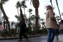 Visitors to the Las Vegas Strip traverse Las Vegas Boulevard on Saturday, March 2, 2024. (Las V ...