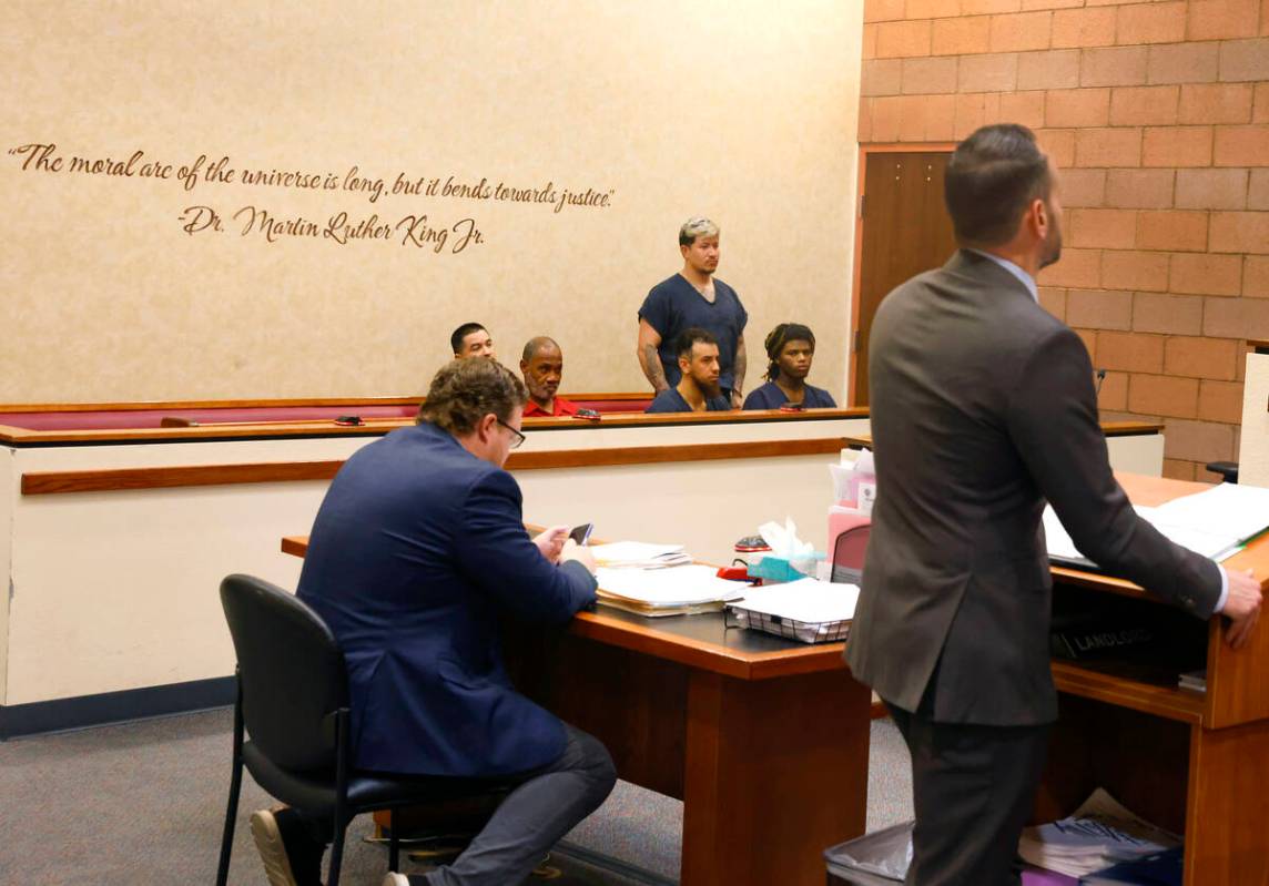 Joseph De Luna, accused of killing Jamie Zamora Gamez, center, listens as his attorney Josh Tom ...