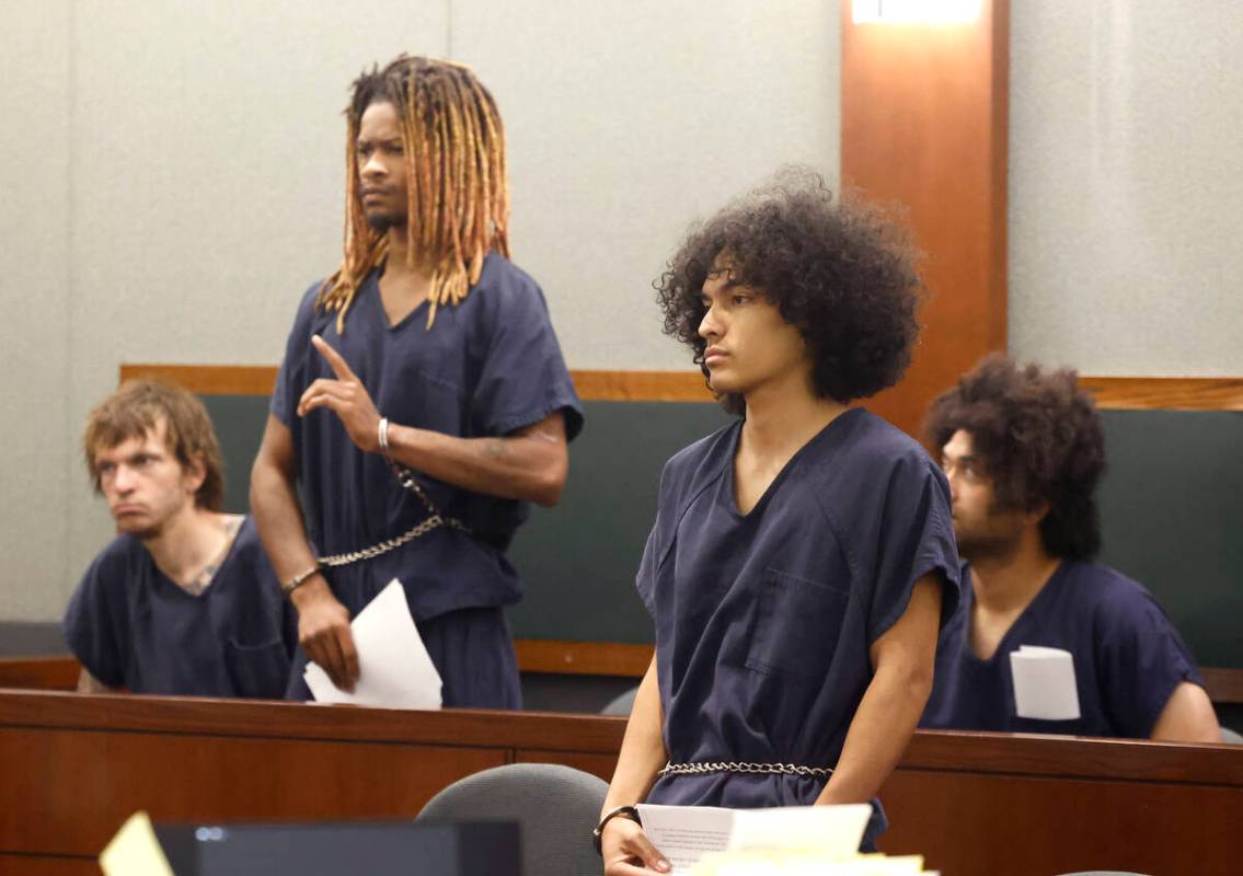 Charles Wright, left, and Phillip Strong, suspects in the death of an Atomic Liquors bartender ...