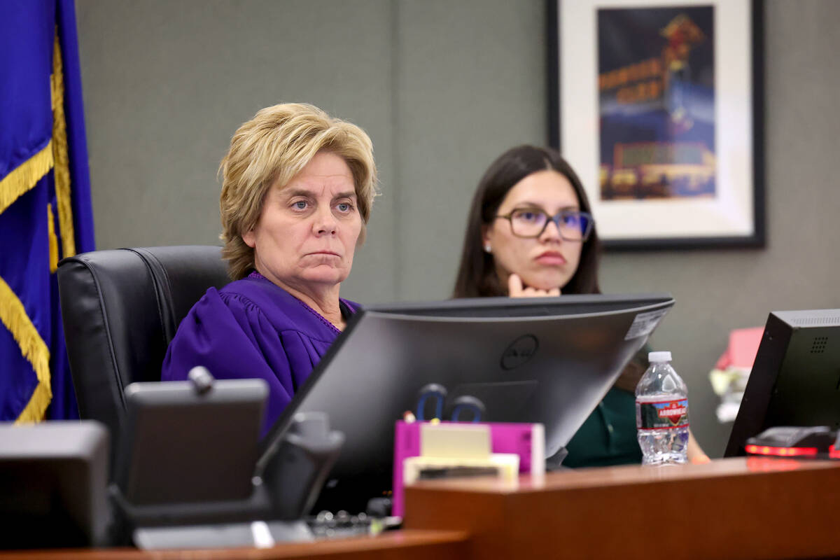 Justice of the Peace Diana Sullivan listens to arguments during a bail hearing for Phillip Stro ...