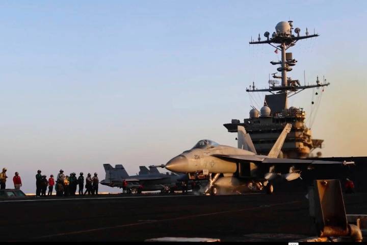 This image taken from video provided by the U.S. Navy shows an aircraft launching from the USS ...