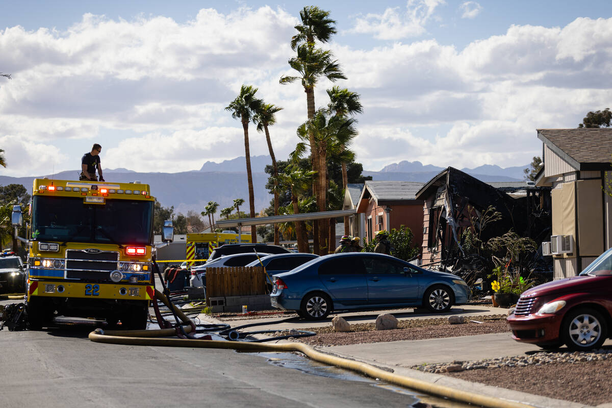 Clark County firefighters respond to a residential fire at a mobile home park off of Tropicana ...