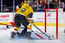 Golden Knights center Jack Eichel (9) scores a goal during an NHL hockey game between the Golde ...