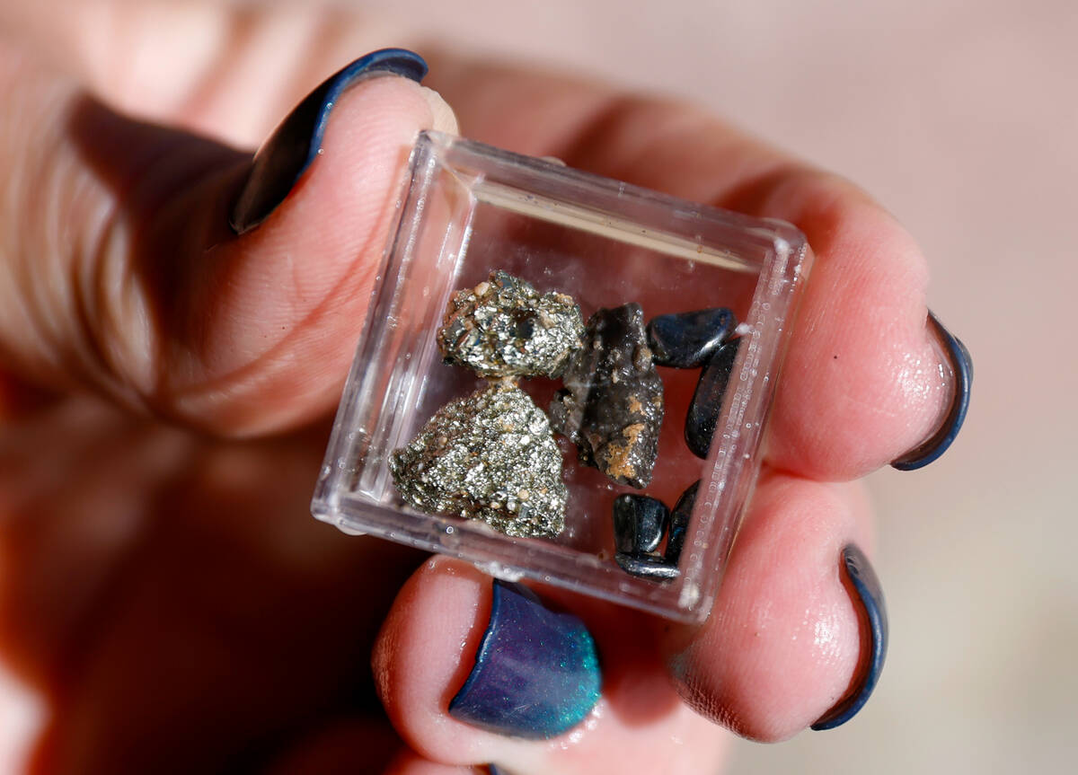 Lisa Filutz, a teacher at Helen Marie Smith Elementary, displays pyrite, a fool's gold, along w ...