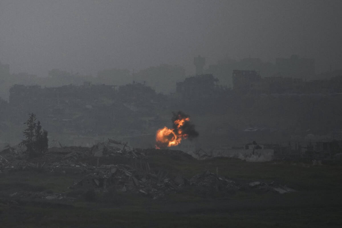 An explosion erupts in the northern Gaza Strip, as seee from southern Israel, on Tuesday, March ...
