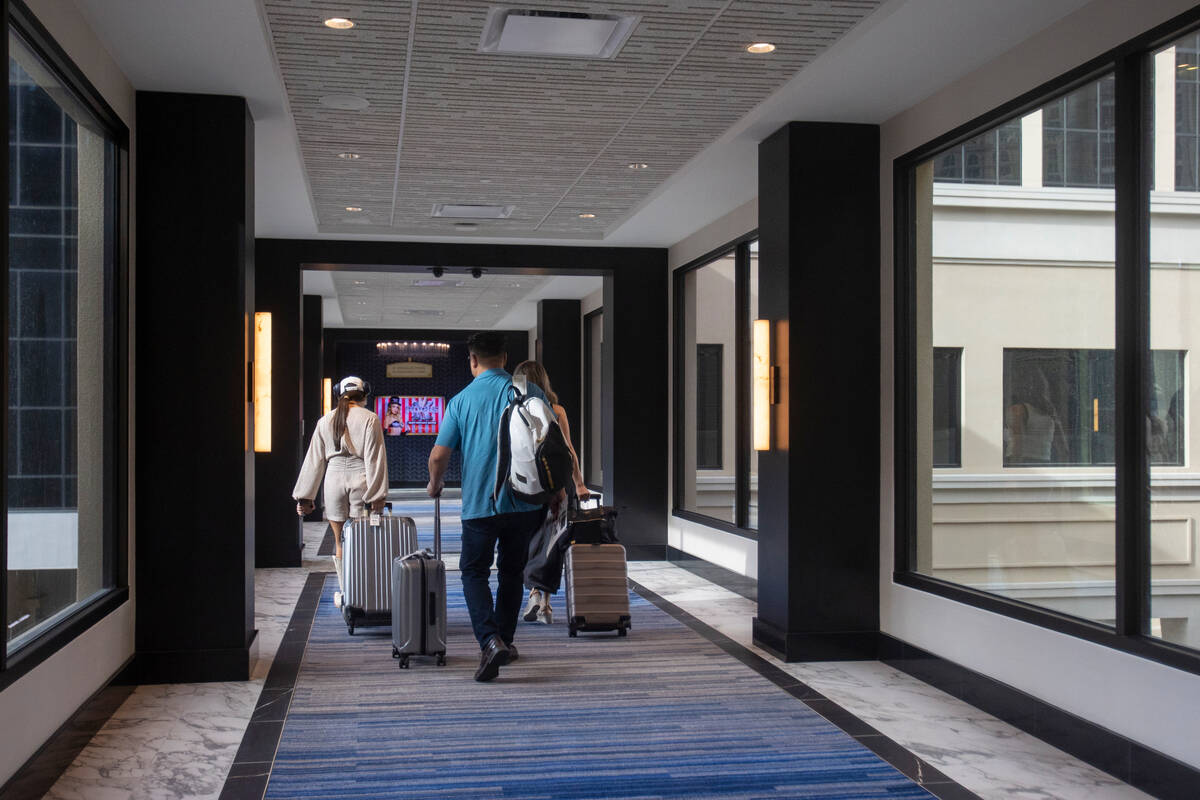 In this Review-Journal file photo, customers walk through the Skybridge at the Paris Las Vegas, ...