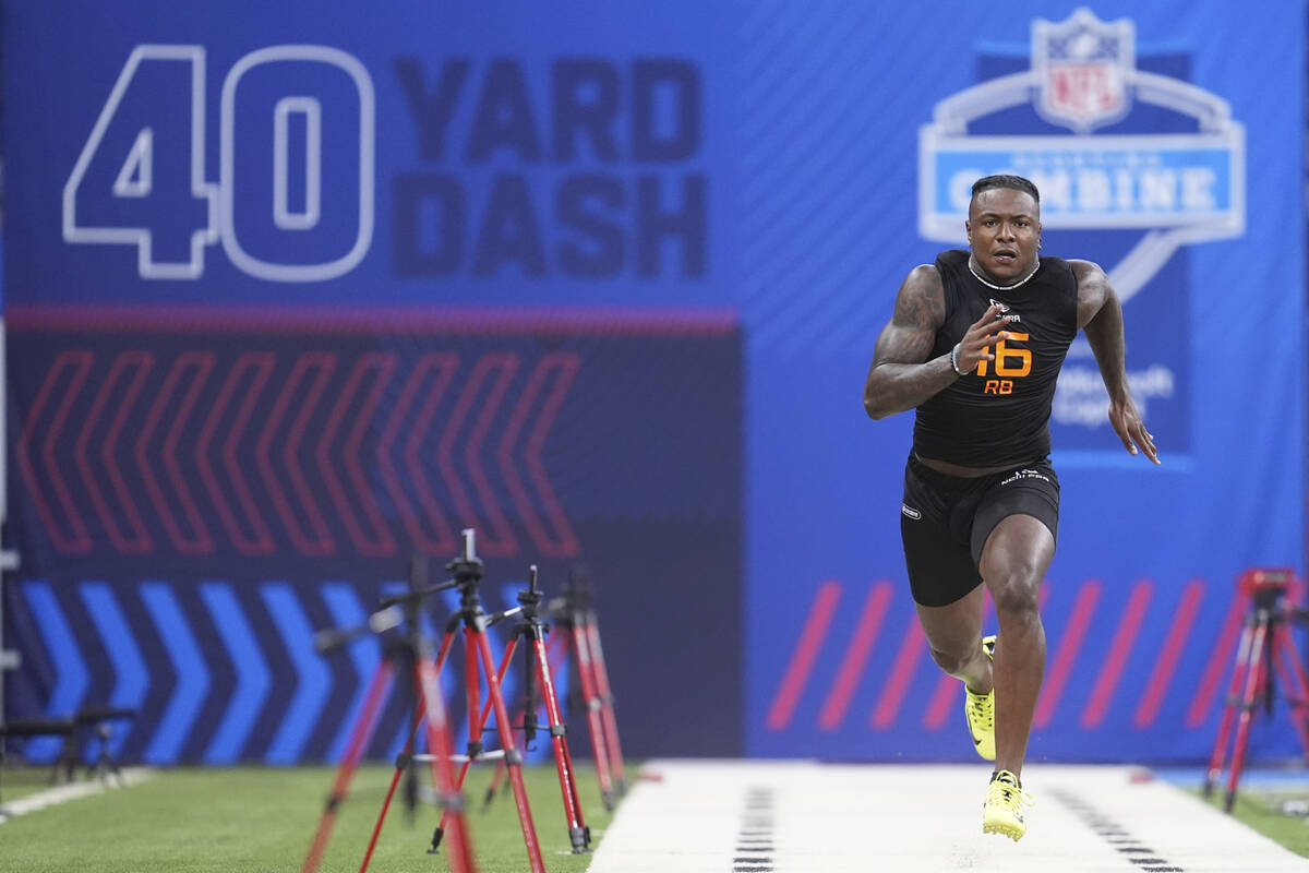 Boise State running back Ashton Jeanty runs the 40-yard dash at the NFL football scouting combi ...