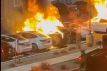 Several Tesla vehicles are seen engulfed in flames after Las Vegas police say they were set on ...